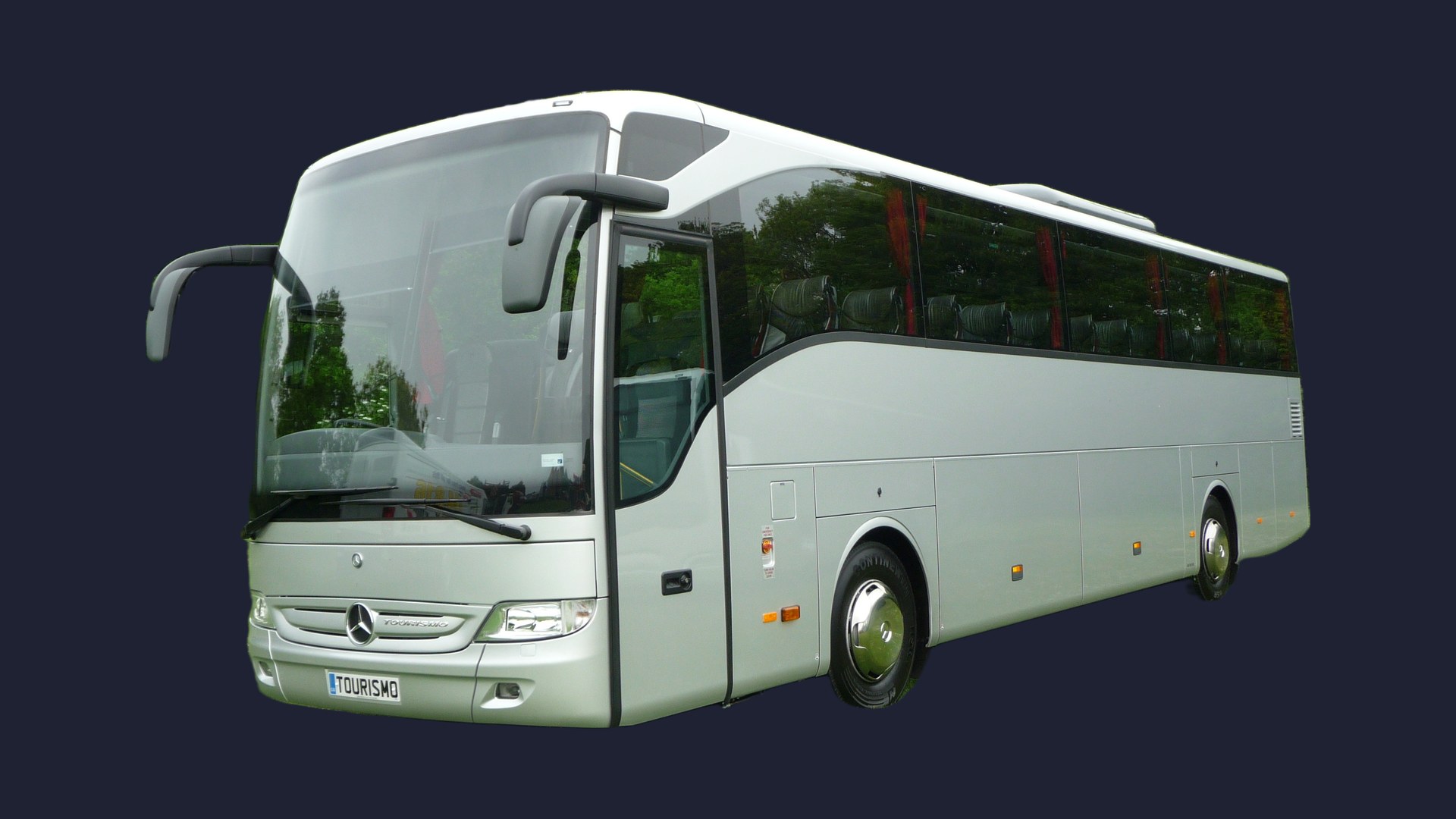 A silver Mercedes-Benz Tourismo full-size coach, front three-quarter view