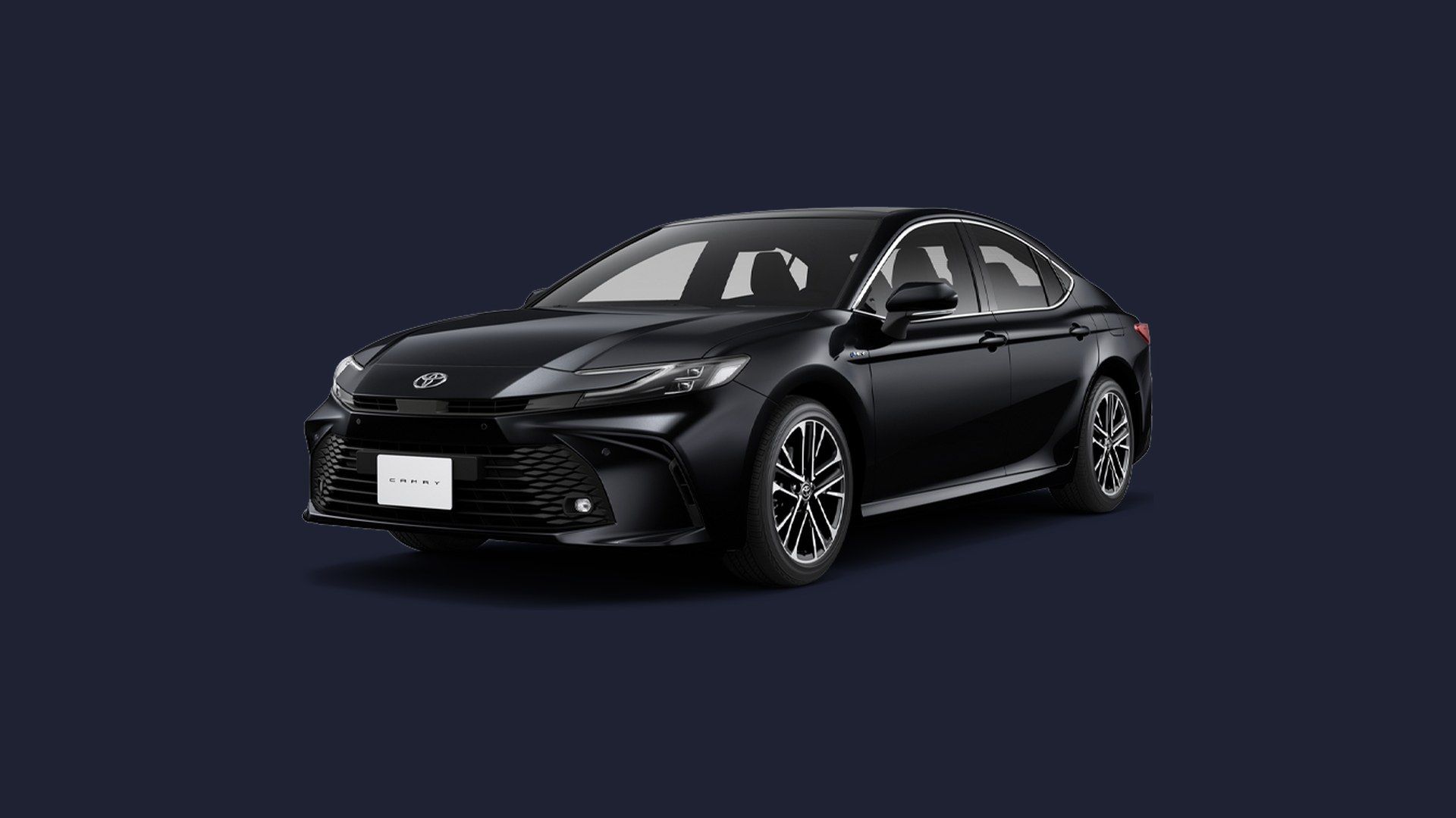 A black Toyota Camry executive sedan, front three-quarter view